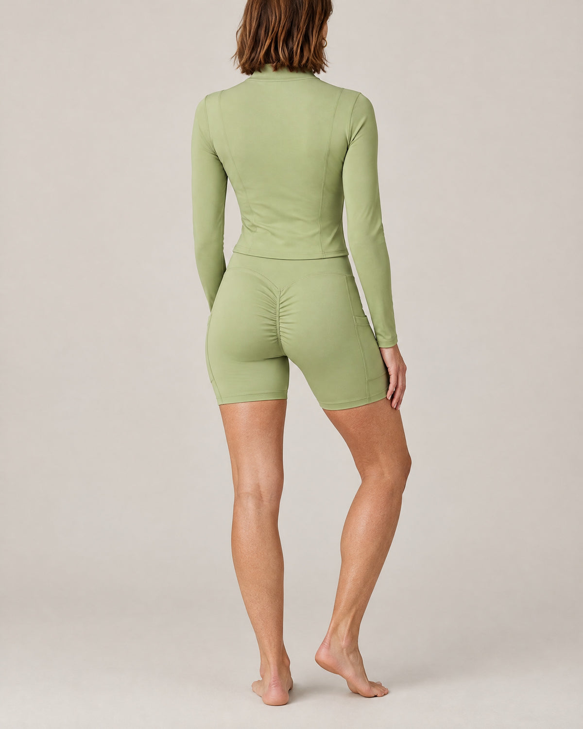 City Pocket Short in gray green, back view