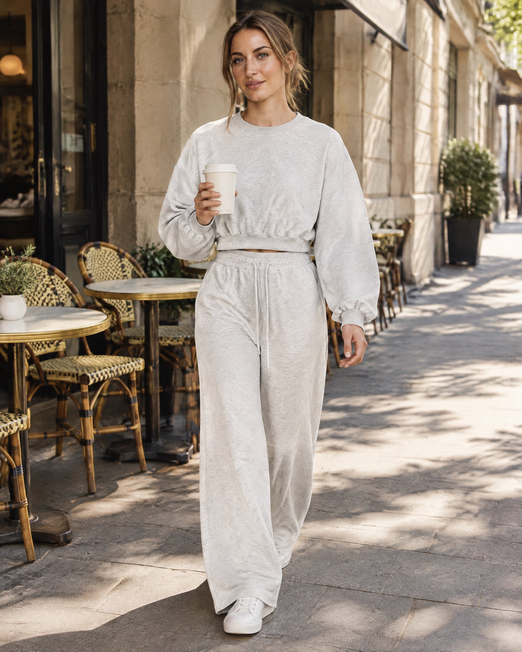 City Boxy Sweatshirt and City Straight-Leg Sweatpant in oat gray, on a city street