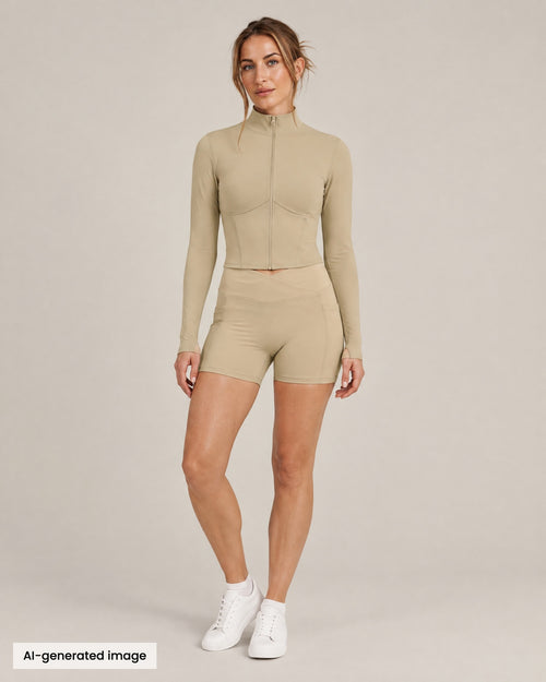 City Zip Jacket and City Pocket Short in khaki, front view. AI-generated image.