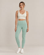 Studio V-Neck Bra in beige and Studio Legging in light green, front view
